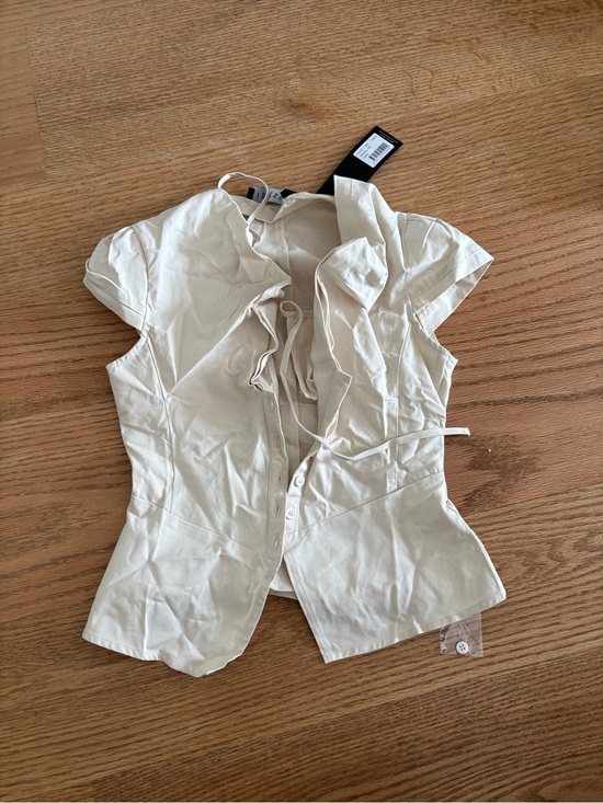 Lioness Tops - Lioness Cream Ruffle-Front Button-Down Cap Sleeve Top